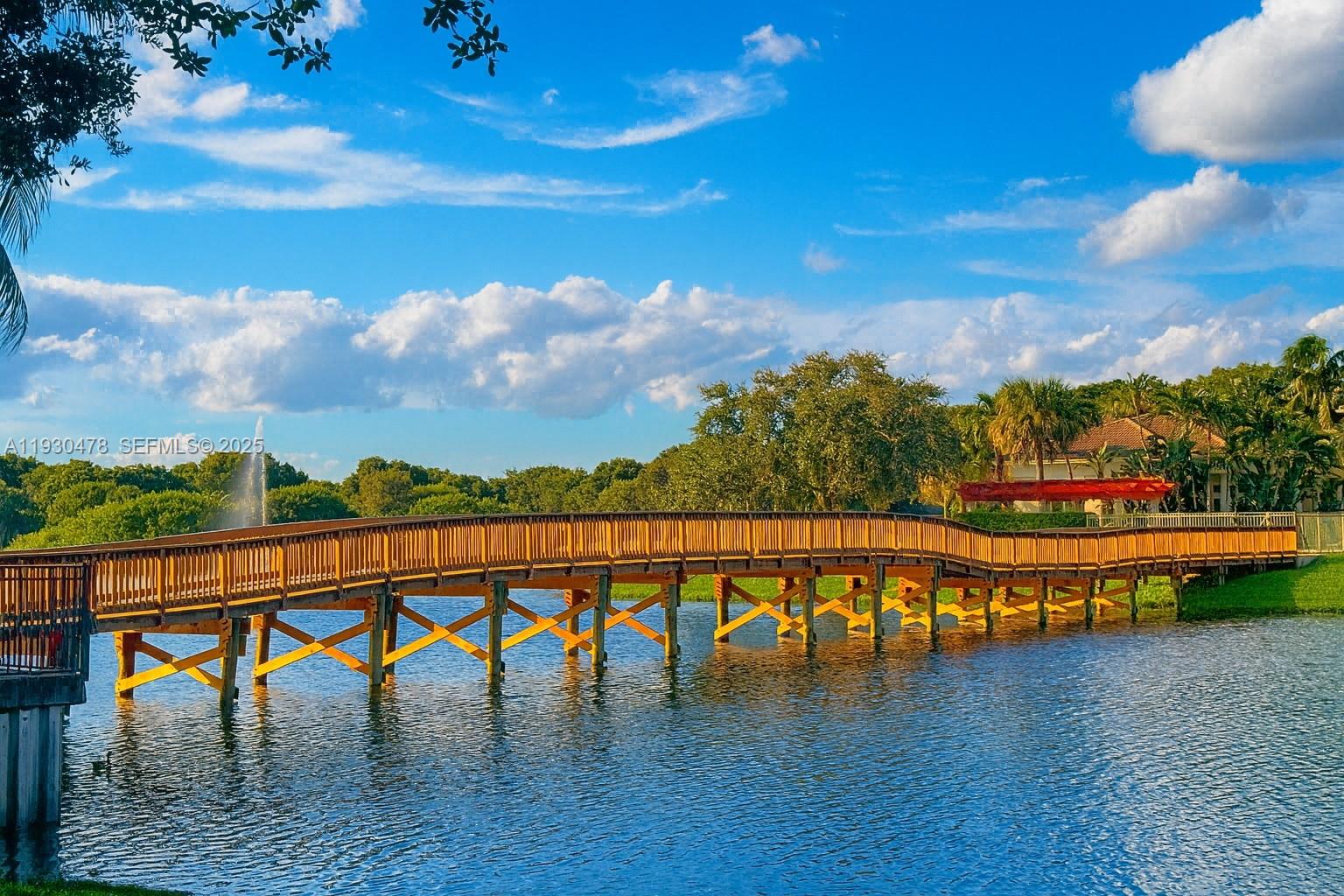 2564 Centergate Drive, Unit 208 Miramar, FL 33025 - Photo 26 of 31 a view of swimming pool with an outdoor seating