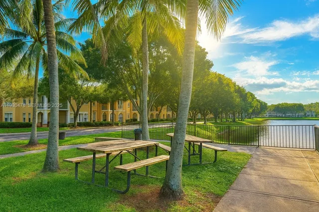 a garden view with a bench