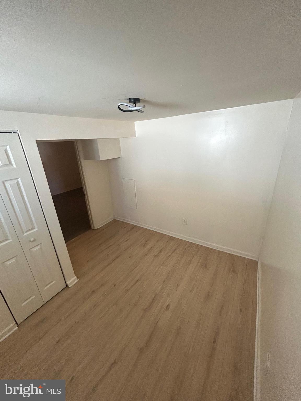 7208 Powhatan Street Lanham, MD 20706 - Photo 17 of 28 a view of an empty room