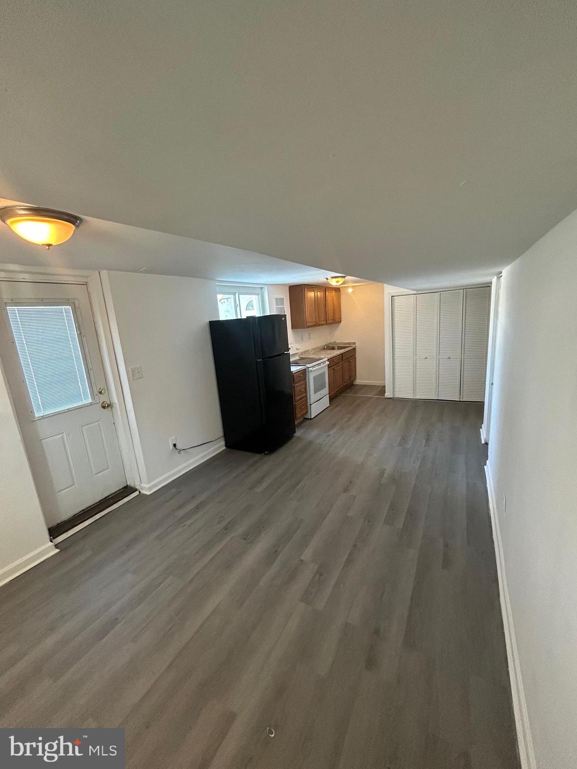 7208 Powhatan Street Lanham, MD 20706 - Photo 25 of 28 a view of a livingroom with wooden floor