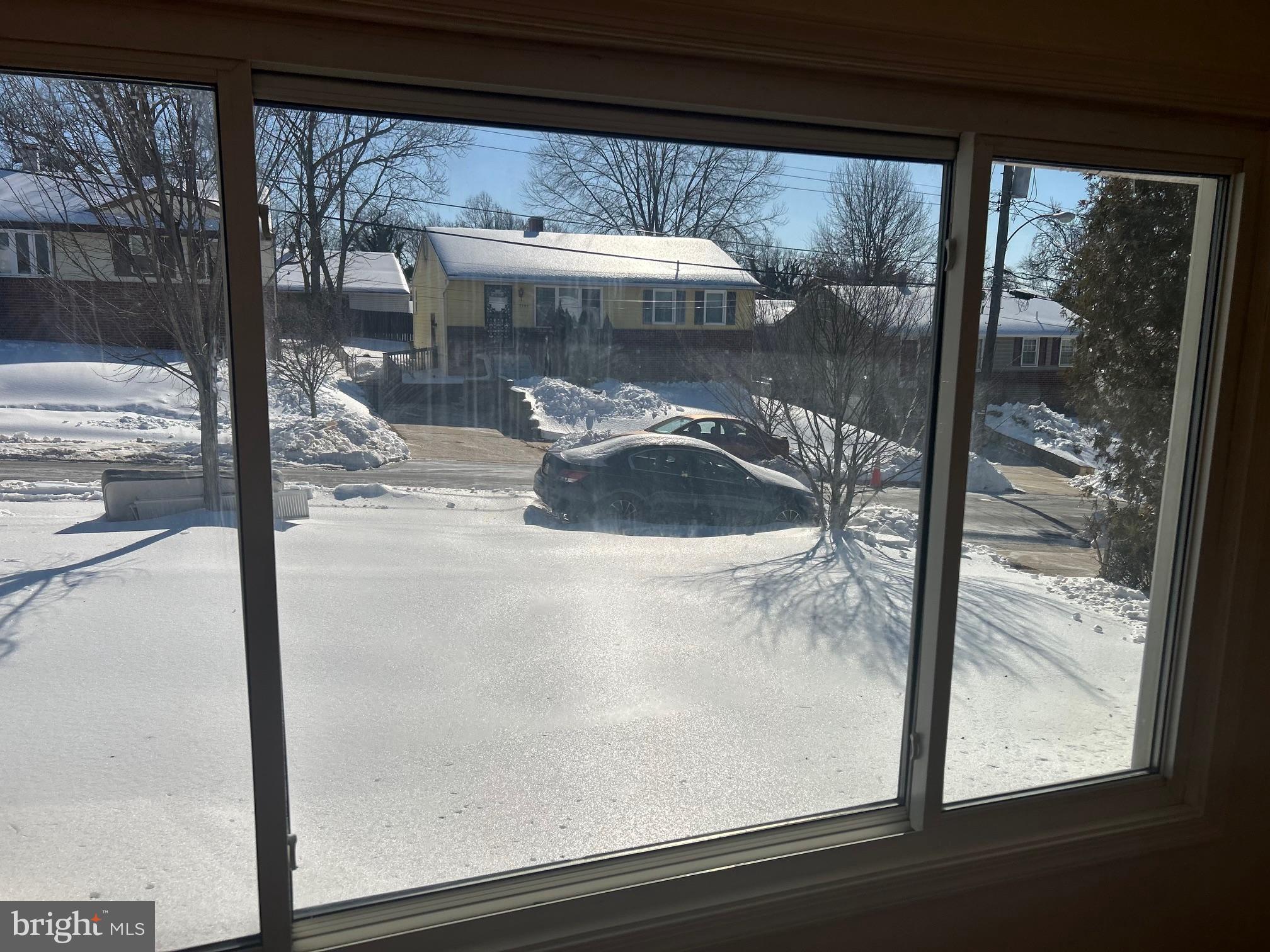7208 Powhatan Street Lanham, MD 20706 - Photo 4 of 28 a view of a glass door with a glass door