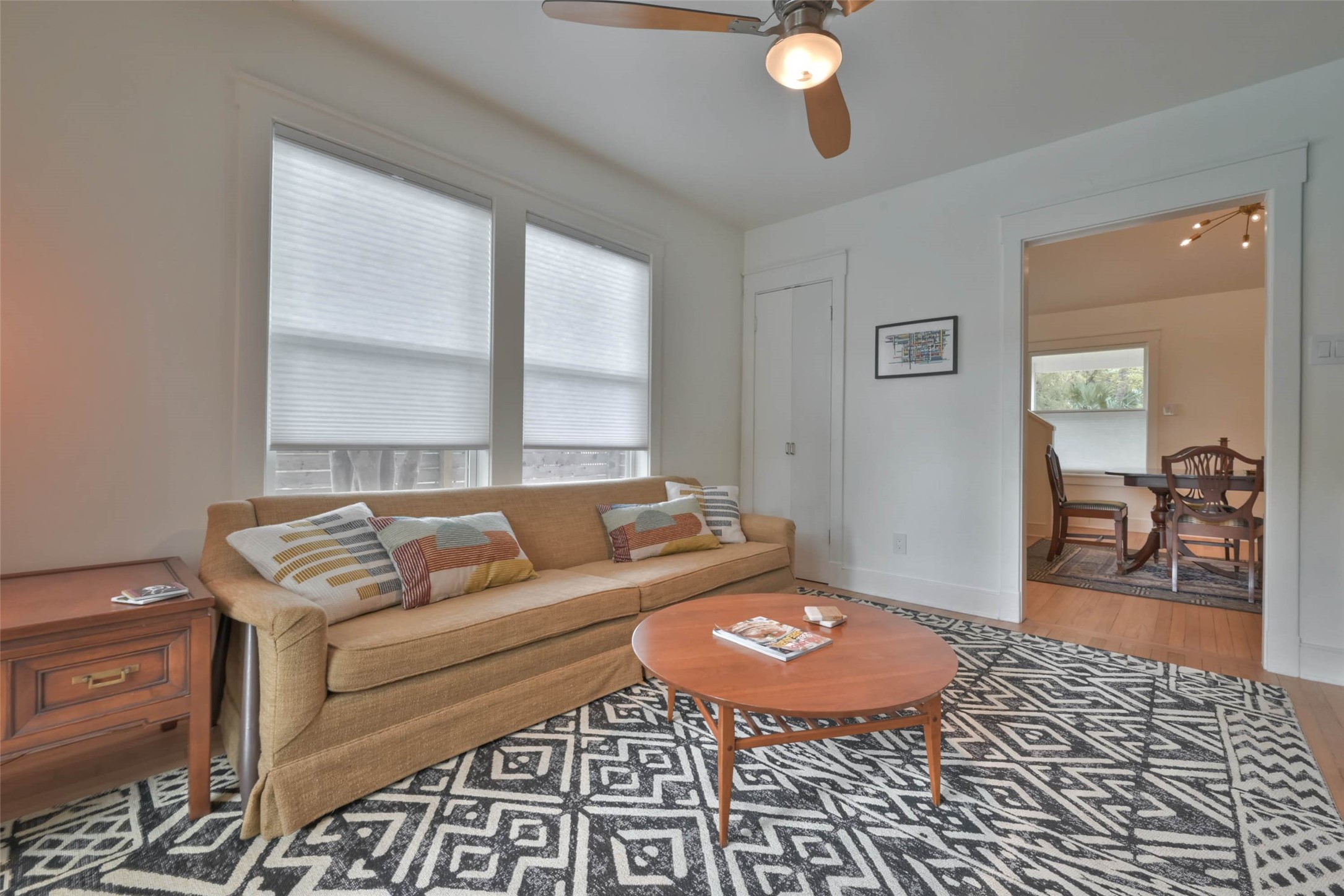 412 Sue Street Houston, TX 77009 - Photo 19 of 19 Another angle of flex room/den looking back into dining area enhancing th eopen floor plan. This cozy living room features large windows for natural light.