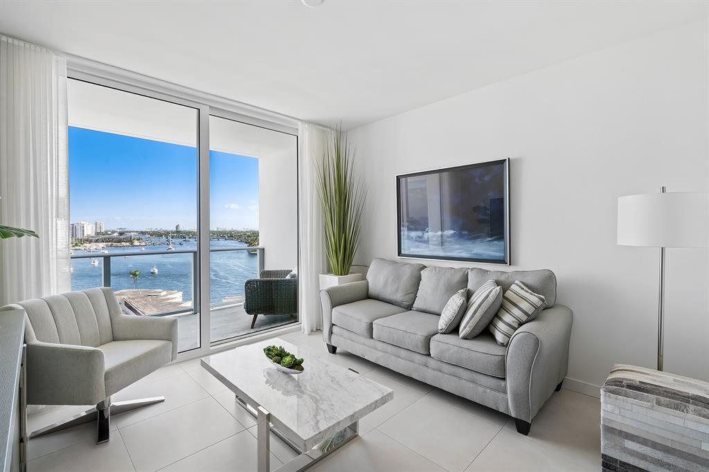 a living room with furniture and a table