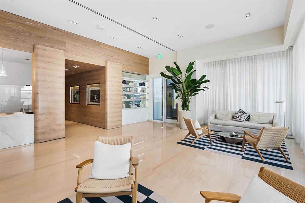 401 North Birch Road, Unit 903 Fort Lauderdale, FL 33304 - Photo 16 of 26 a living room with furniture flowerpot and wooden floor