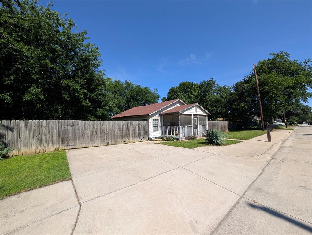 308 Short Street Mansfield, TX 76063 - Photo 2 of 21 a front view of a house with a yard
