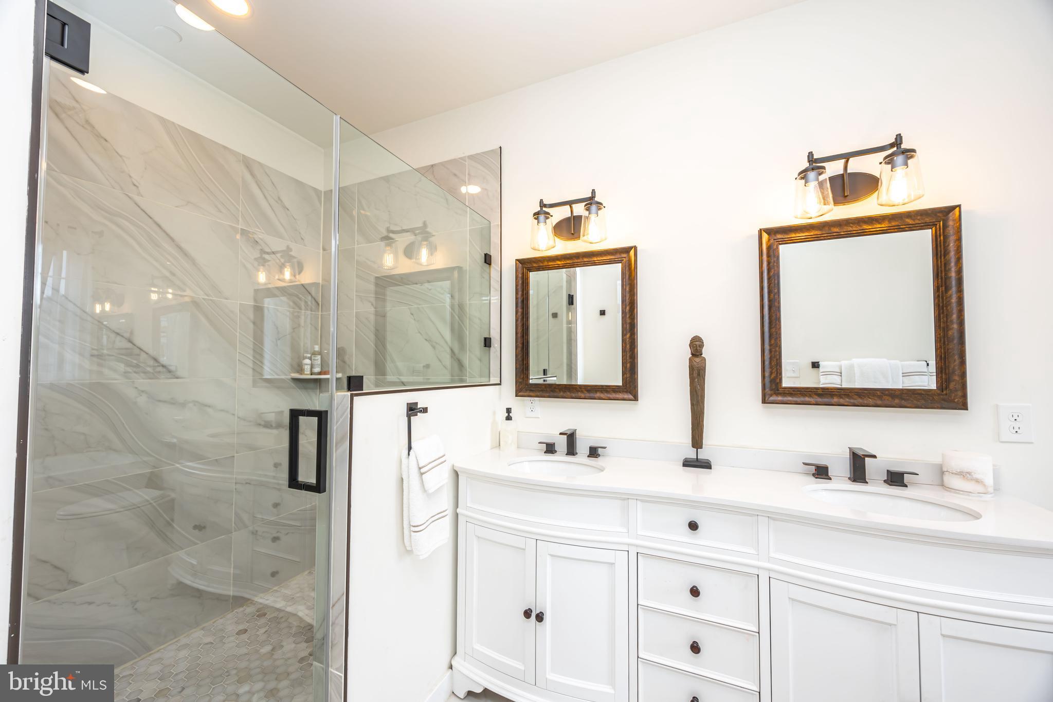 1117 Chester Road Middle River, MD 21220 - Photo 15 of 95 a bathroom with a double vanity sink mirror and