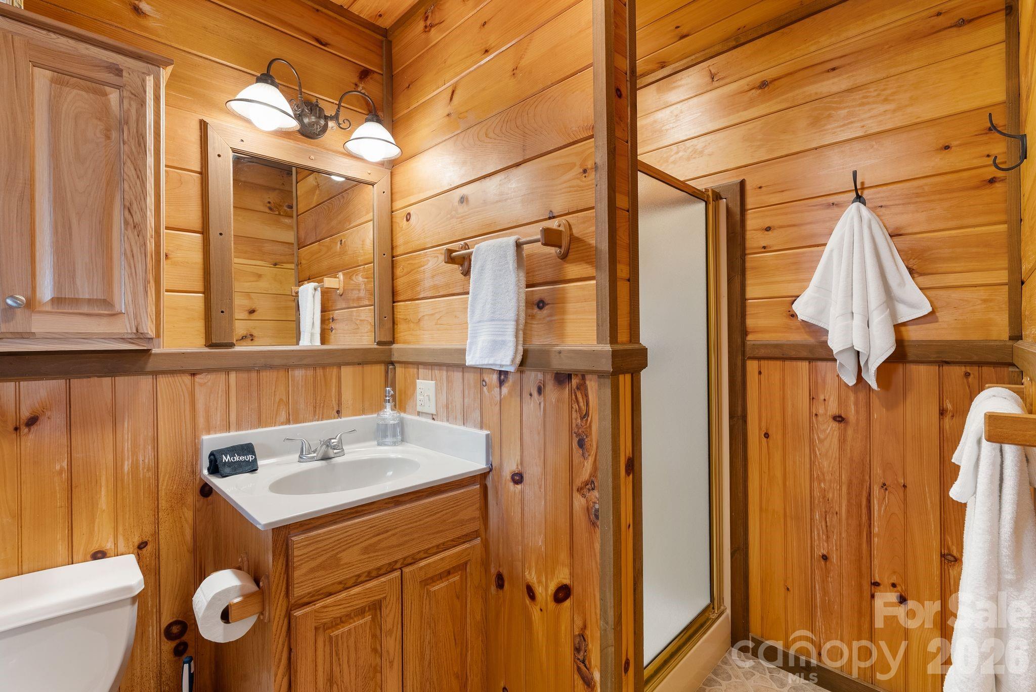 264 Moonbeam Lane Clyde, NC 28721 - Photo 18 of 46 a utility room with dryer and washer