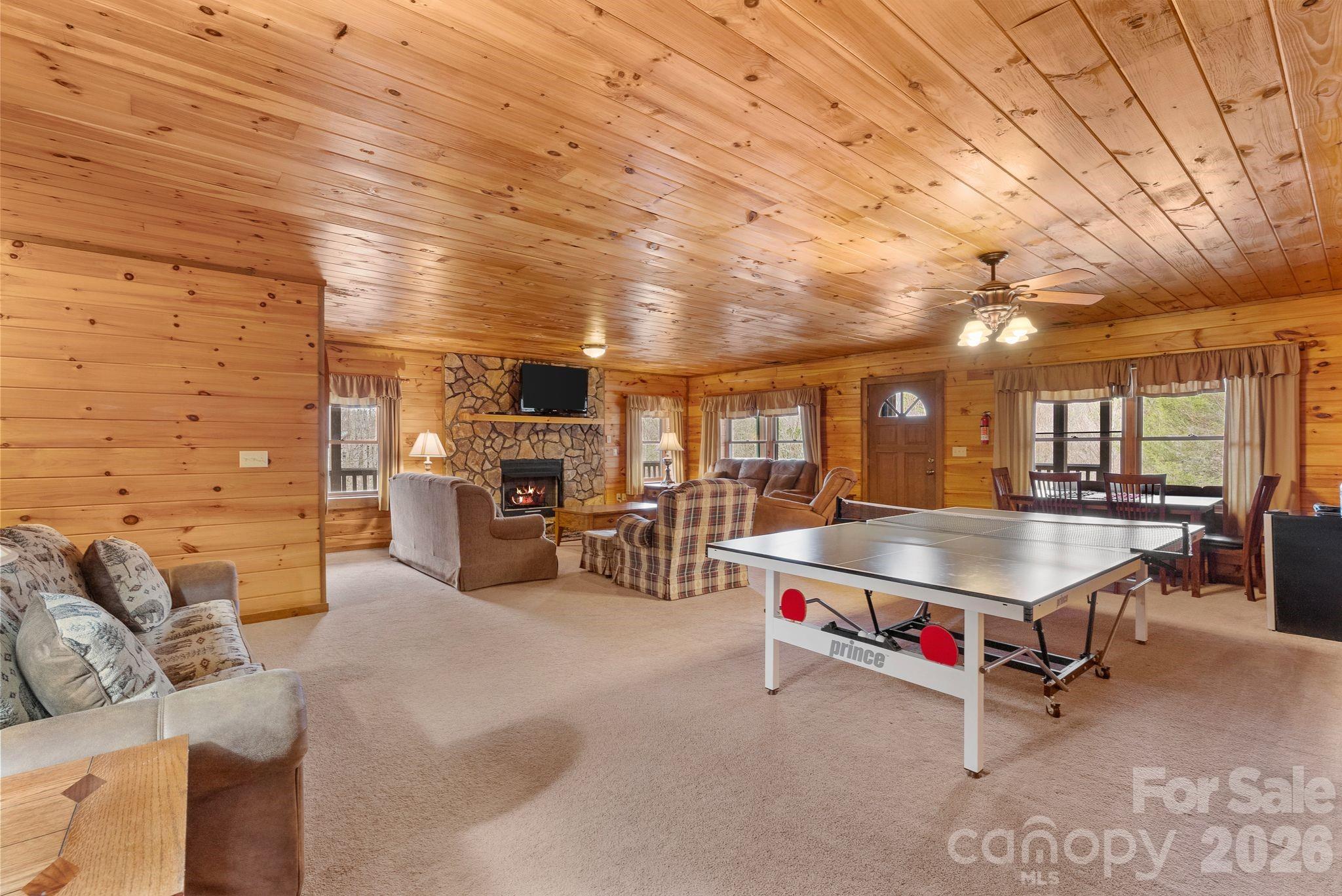 264 Moonbeam Lane Clyde, NC 28721 - Photo 26 of 46 a room with pool table and furniture