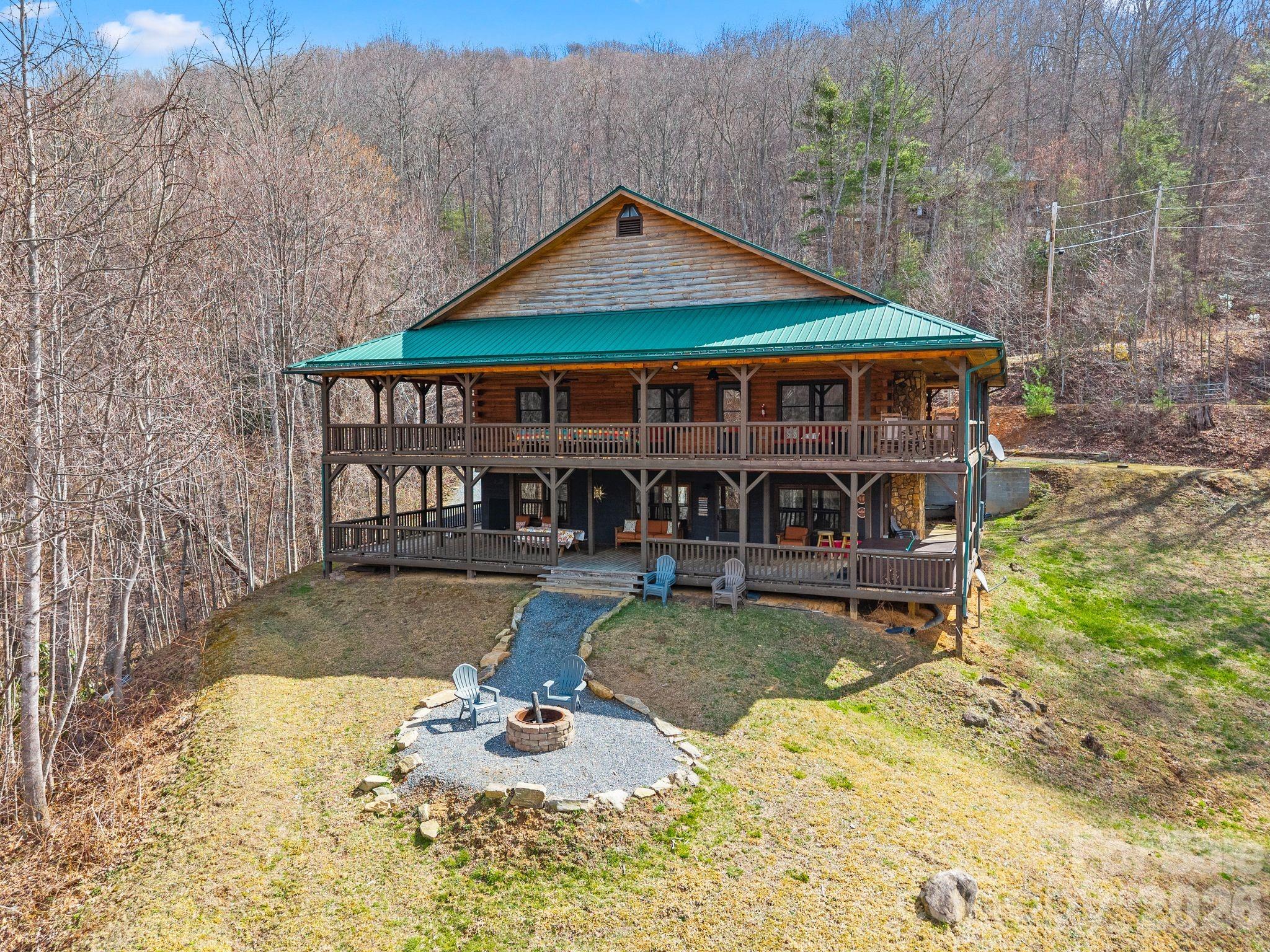 264 Moonbeam Lane Clyde, NC 28721 - Photo 40 of 46 swimming pool view with a seating space