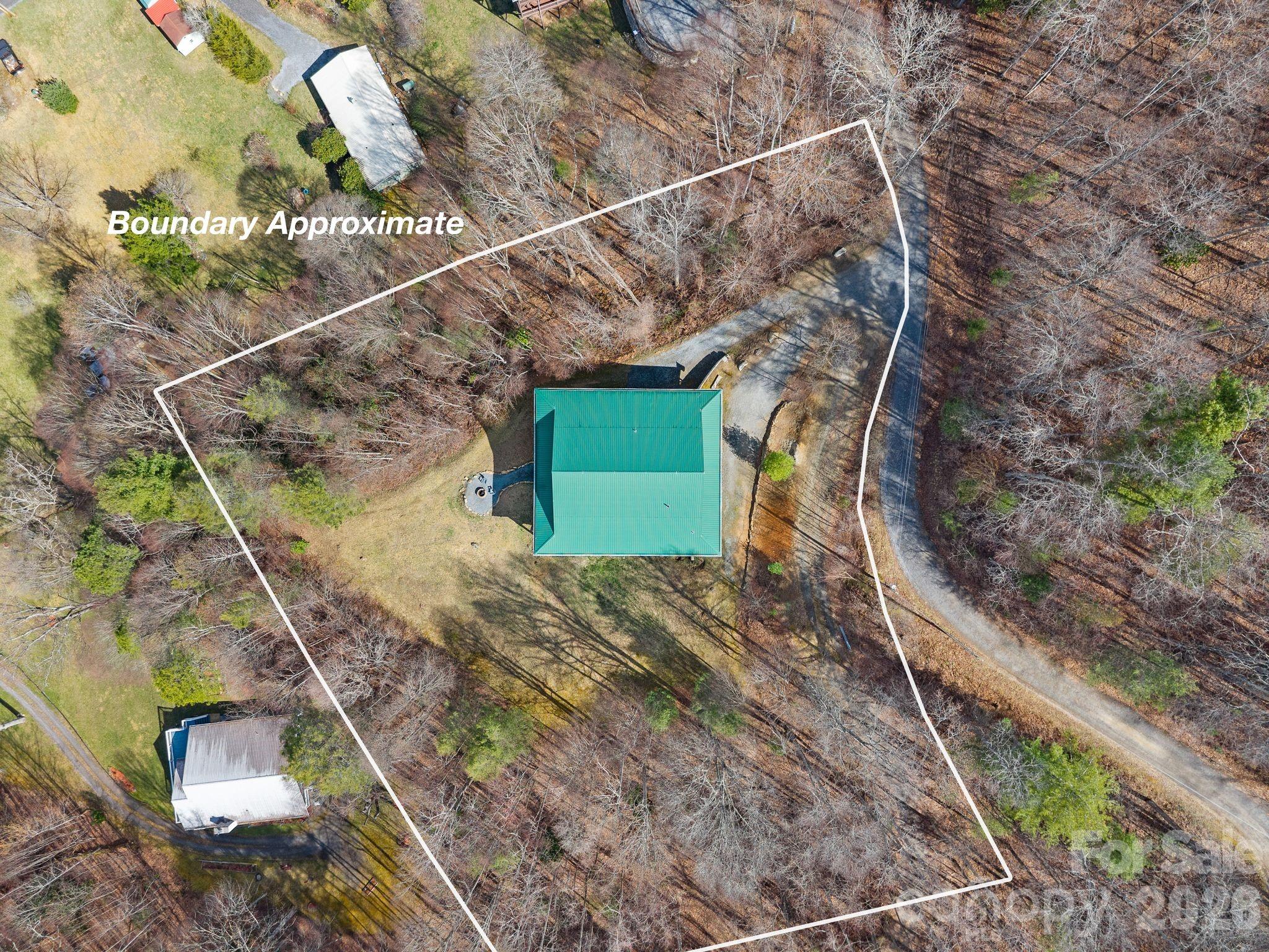 264 Moonbeam Lane Clyde, NC 28721 - Photo 41 of 46 a view of a yard with wooden stairs