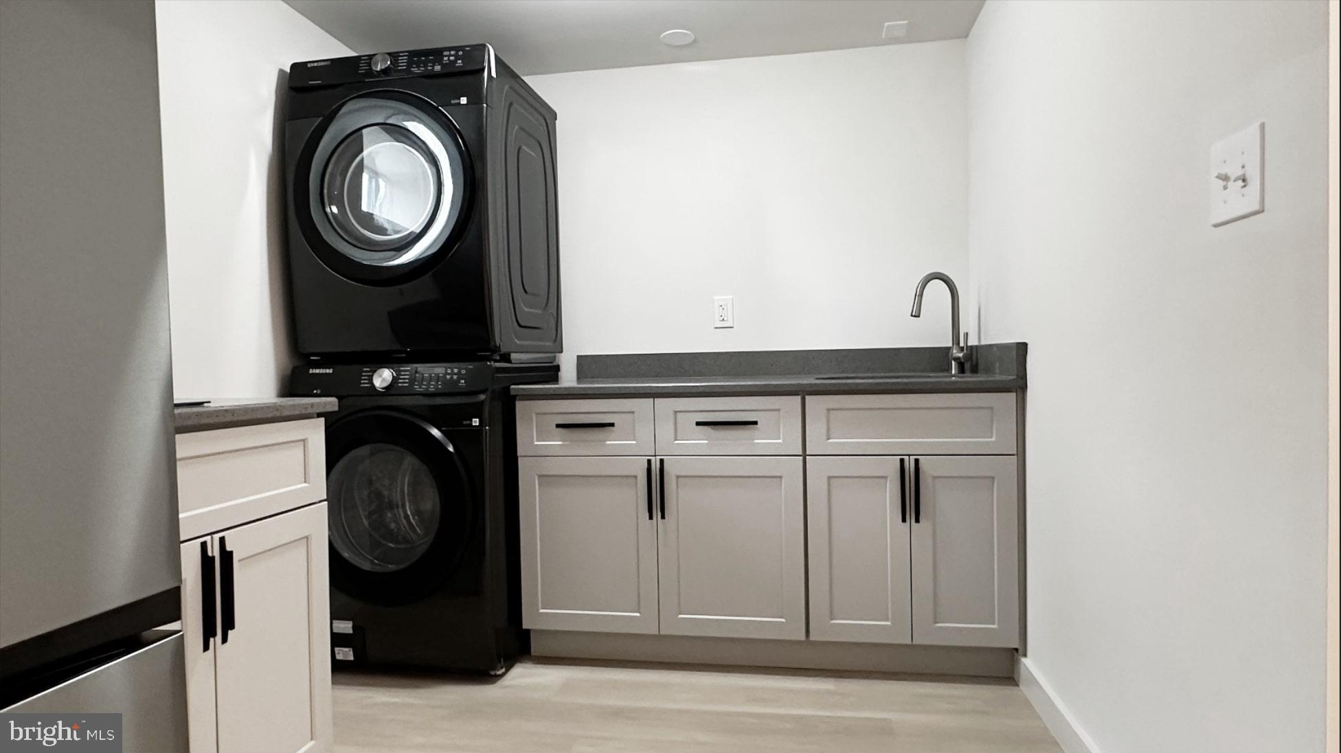 8802 Ashford Road Parkville, MD 21234 - Photo 25 of 39 a utility room with dryer and washer