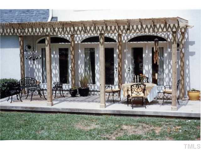 8309 Johnson Mill Road Bahama, NC 27503 - Photo 10 of 12 The terrace and pergola are waiting for a gardner's magic touch!