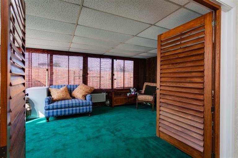 985 Spring Street Oak View, CA 93022 - Photo 8 of 15 a living room with furniture and a gate