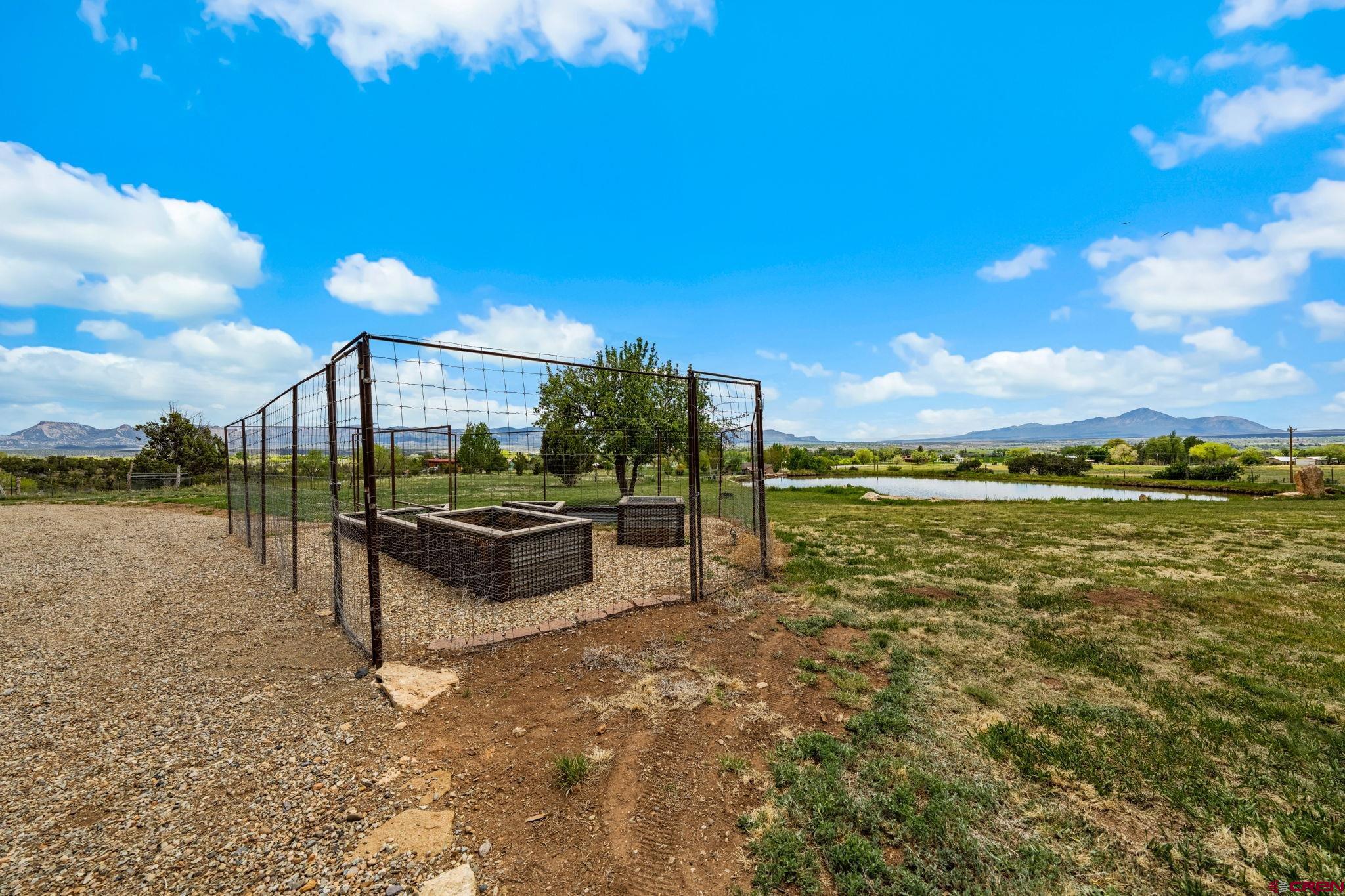 27778 Rd P Dolores, CO 81323 - Photo 15 of 45 a view of a lake with couches in the patio