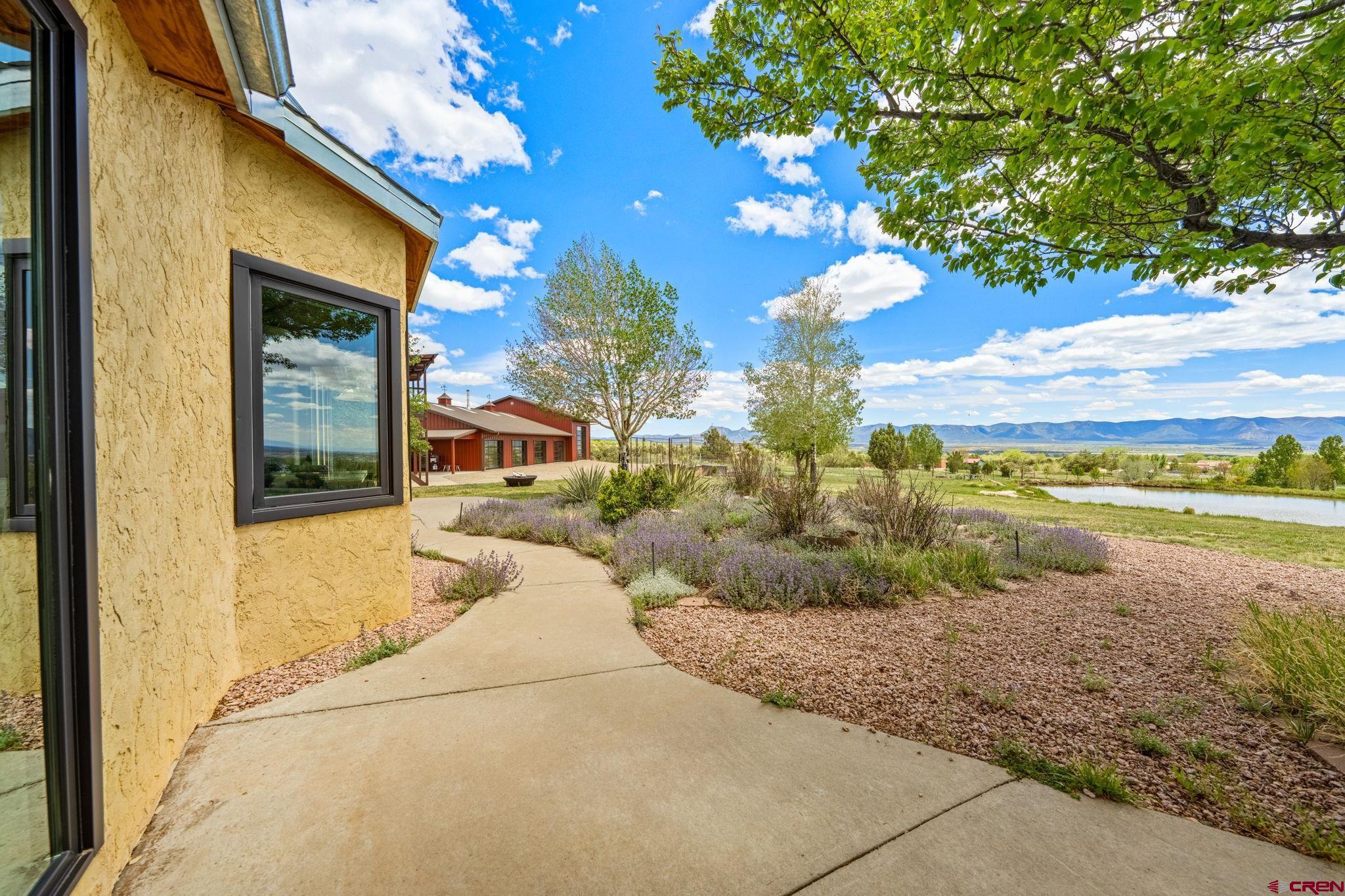 27778 Rd P Dolores, CO 81323 - Photo 17 of 45 a view of a house with a yard