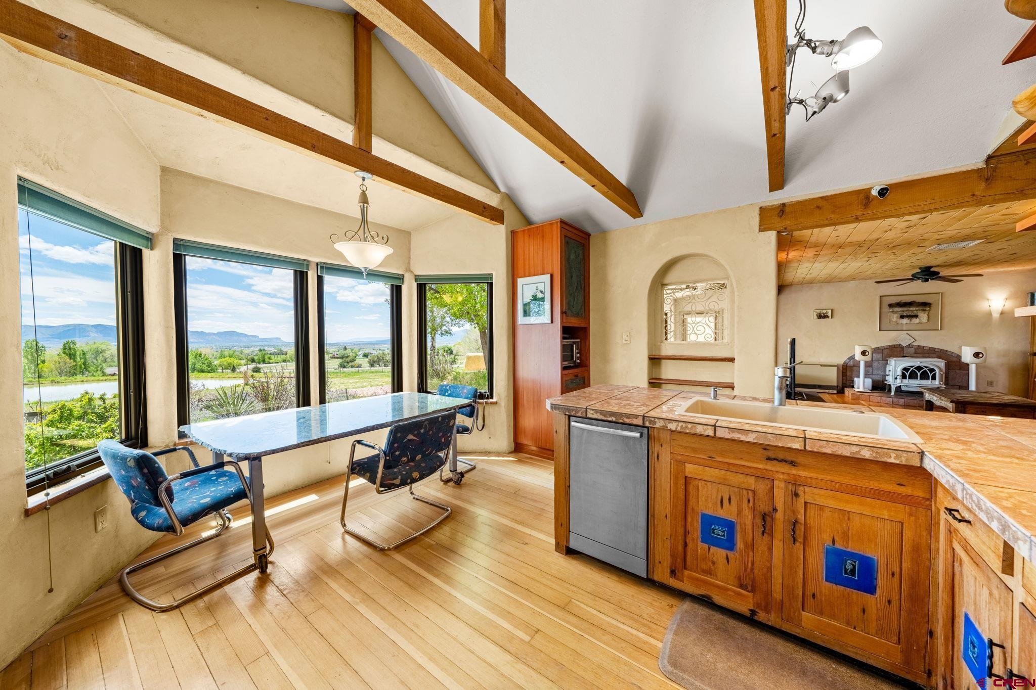 27778 Rd P Dolores, CO 81323 - Photo 19 of 45 a very nice looking living room with wooden floor and furniture