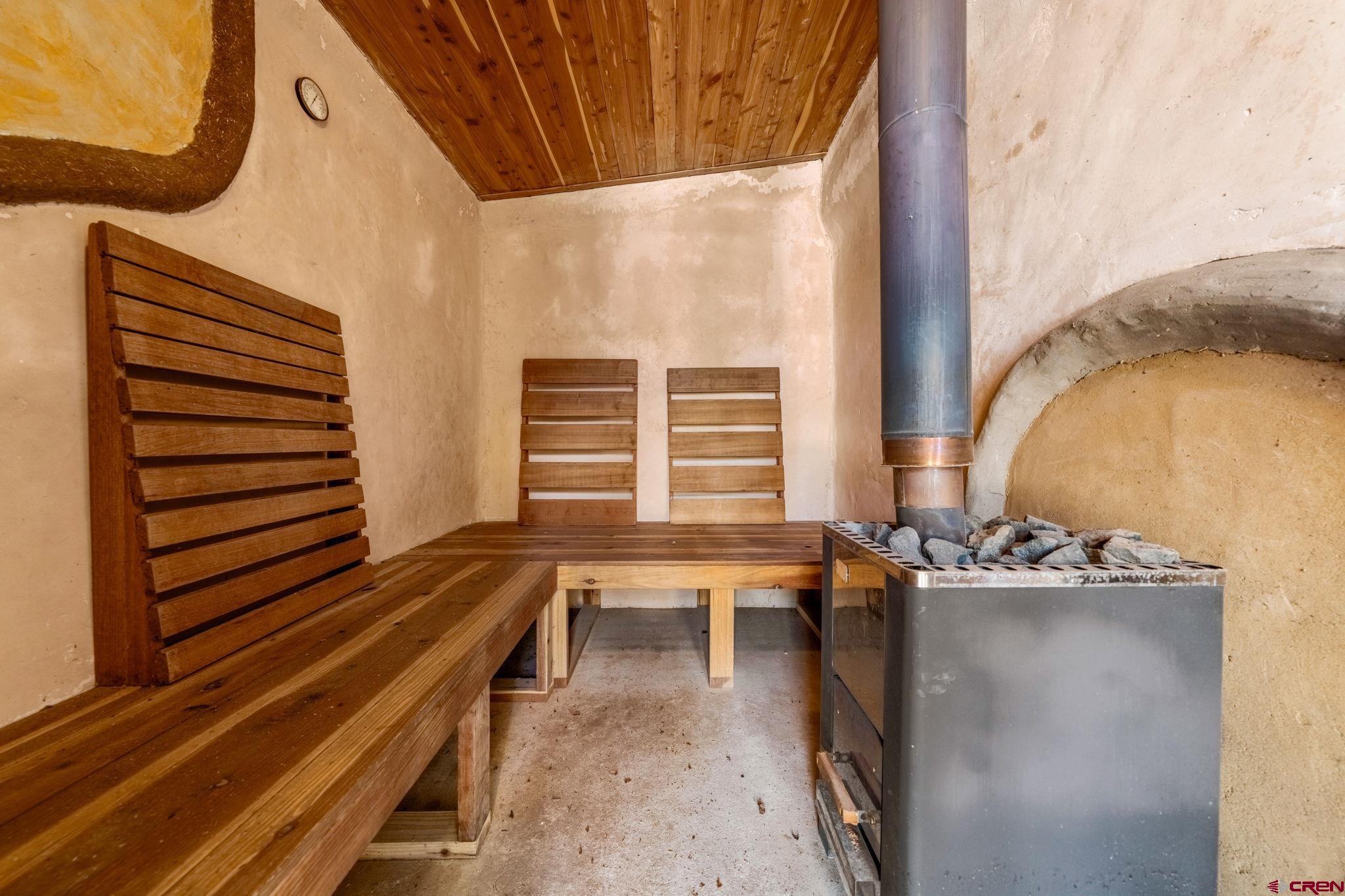 27778 Rd P Dolores, CO 81323 - Photo 34 of 45 a reading room with wooden floor and furniture