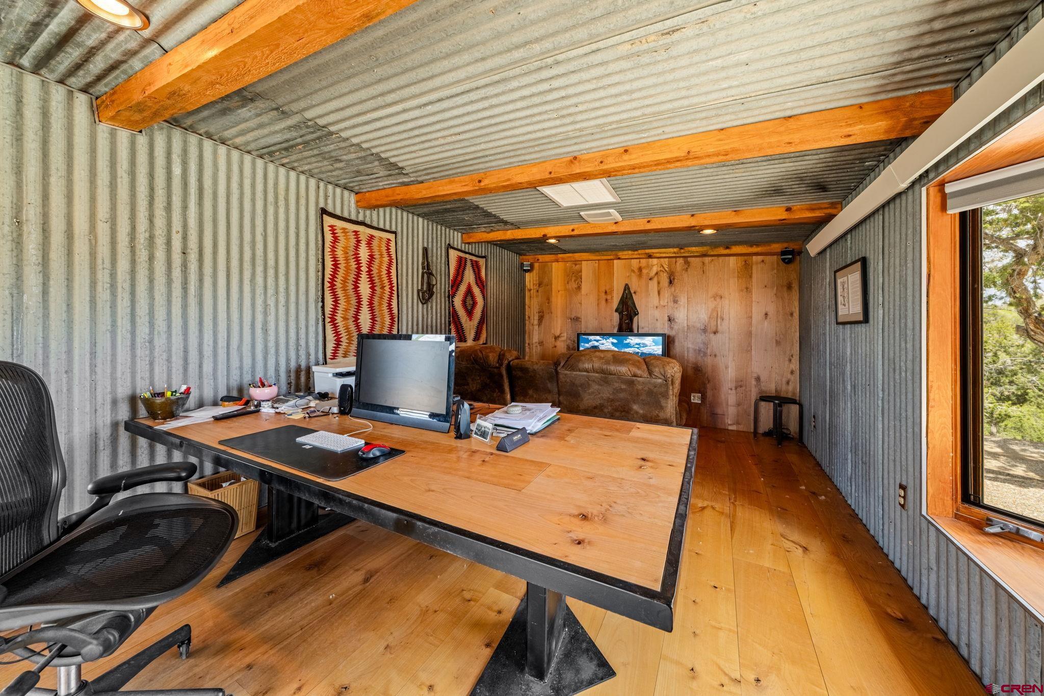 27778 Rd P Dolores, CO 81323 - Photo 35 of 45 a patio with a table and chairs