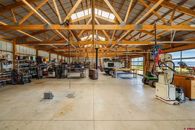 a view of swimming pool with outdoor seating