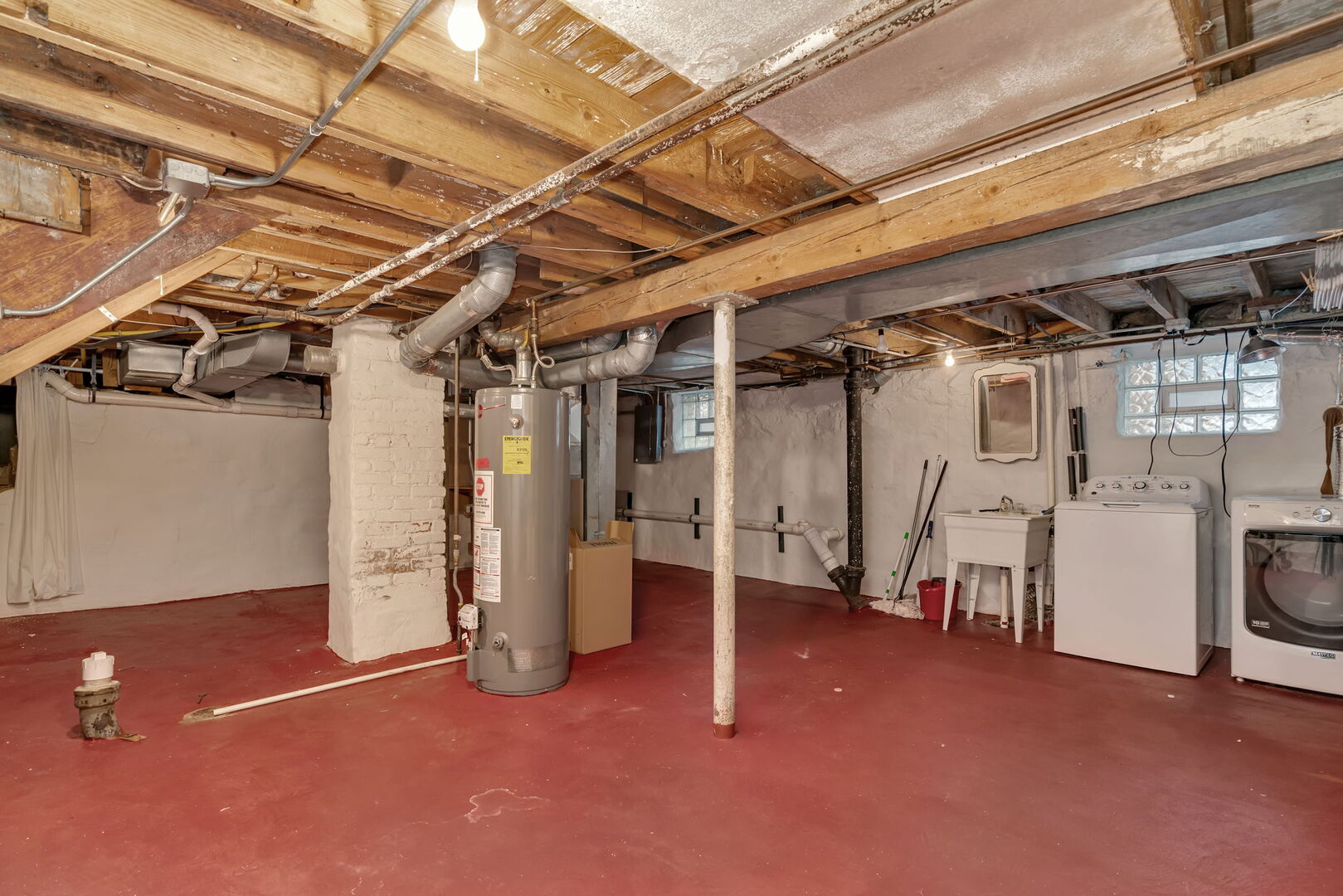 1105 Taylor Street Joliet, IL 60435 - Photo 19 of 24 a view of empty room with washer and dryer
