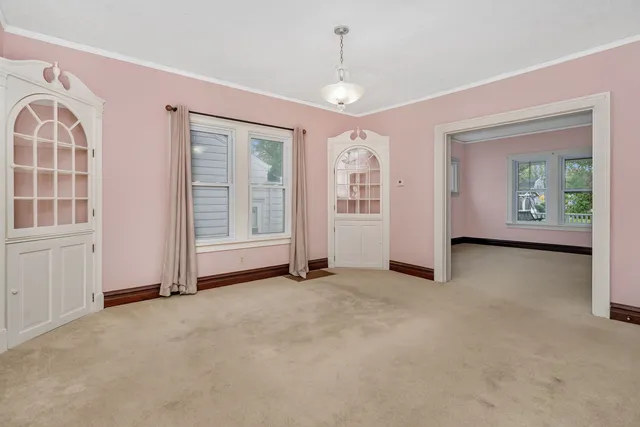 an empty room with windows