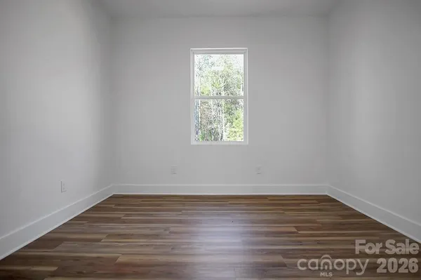 a view of livingroom with floor to ceiling window