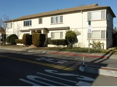 a view of a house with a street