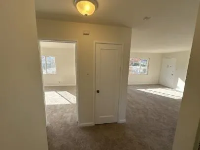 a view of an empty room and window