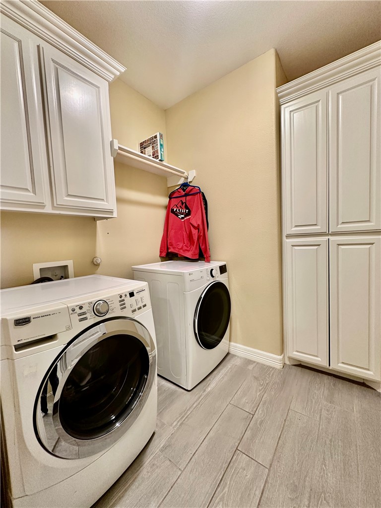 5434 Neela Corpus Christi, TX 78413 - Photo 29 of 31 a utility room with dryer and washer