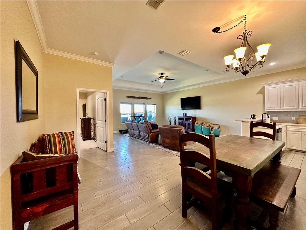 5434 Neela Corpus Christi, TX 78413 - Photo 7 of 31 a living room with furniture and a flat screen tv