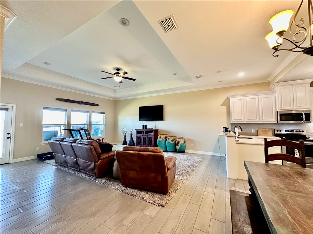 5434 Neela Corpus Christi, TX 78413 - Photo 10 of 31 a living room with furniture and a flat screen tv