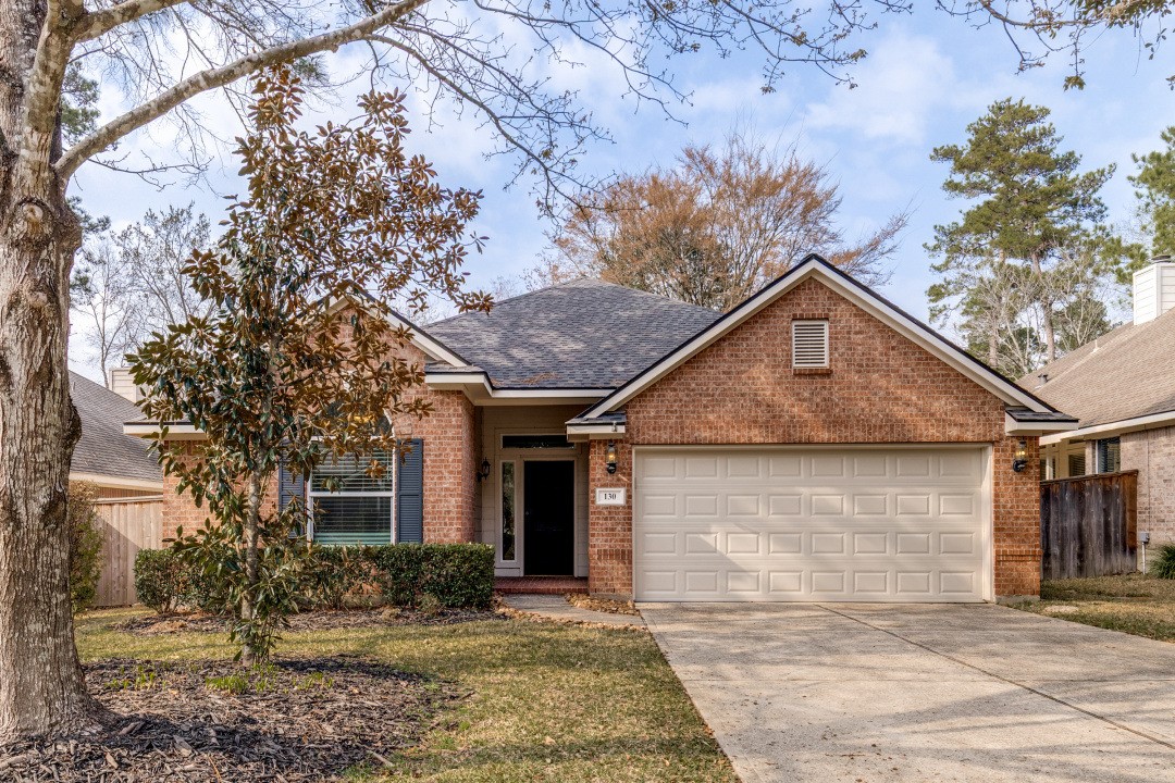 130 South Veranda Ridge Drive Spring, TX 77382 - Photo 1 of 23 a front view of a house with a yard