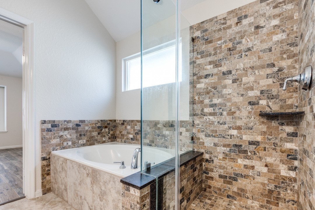130 South Veranda Ridge Drive Spring, TX 77382 - Photo 14 of 23 a bath tub sitting in a bathroom next to a sink