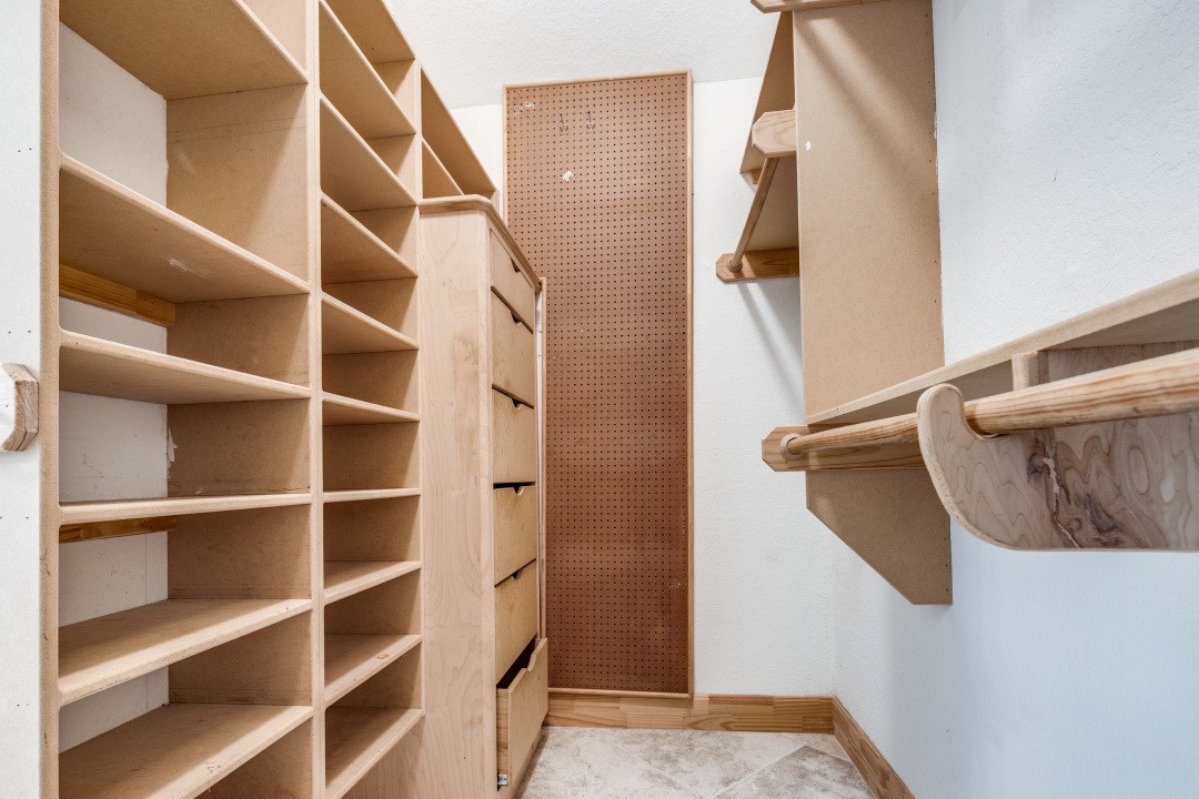 130 South Veranda Ridge Drive Spring, TX 77382 - Photo 15 of 23 a view of walk in closet with empty racks