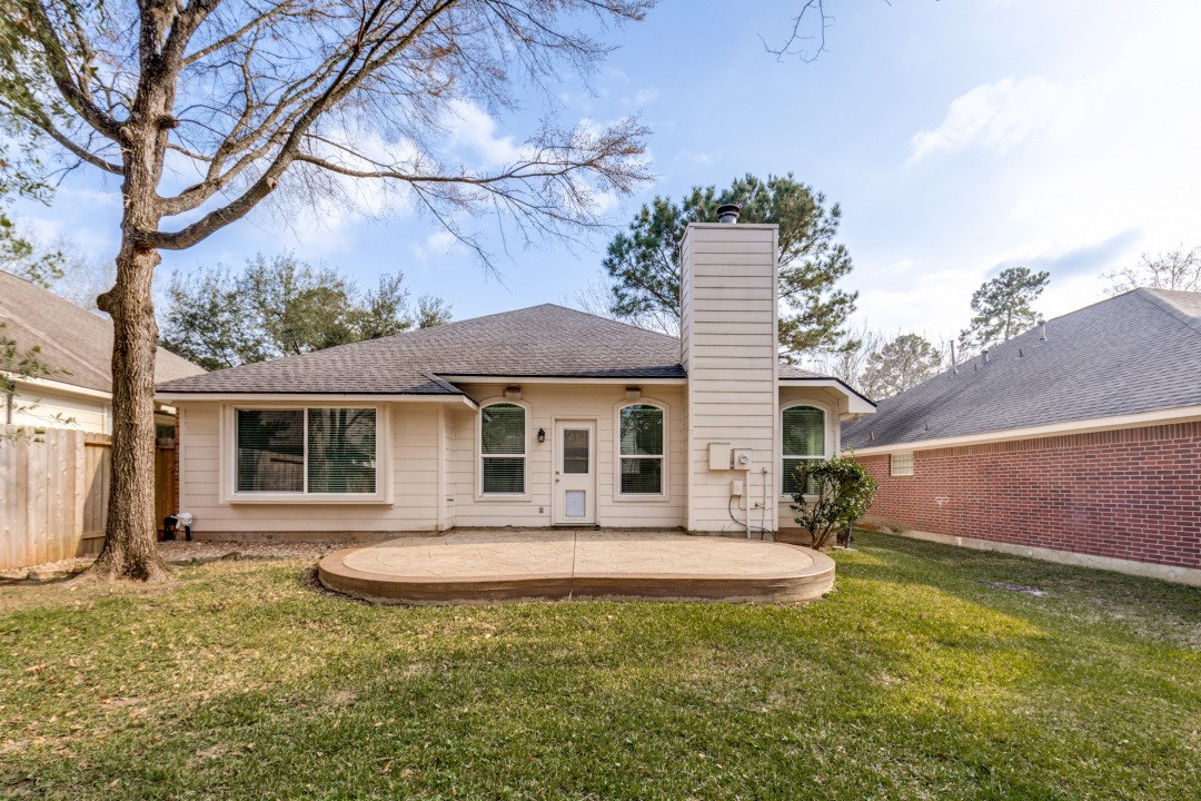 130 South Veranda Ridge Drive Spring, TX 77382 - Photo 22 of 23 a front view of a house with garden