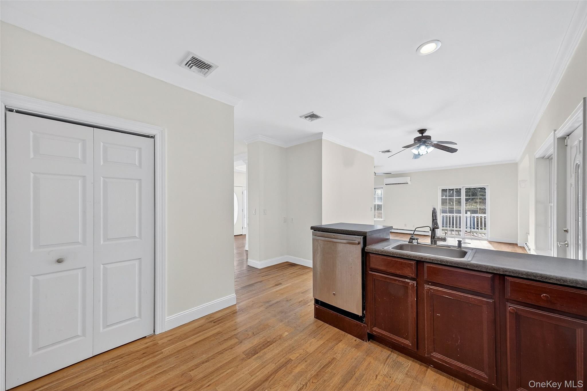 237 Lattintown Road Marlboro, NY 12542 - Photo 15 of 34 a view of a kitchen counter space a sink wooden floor and a window