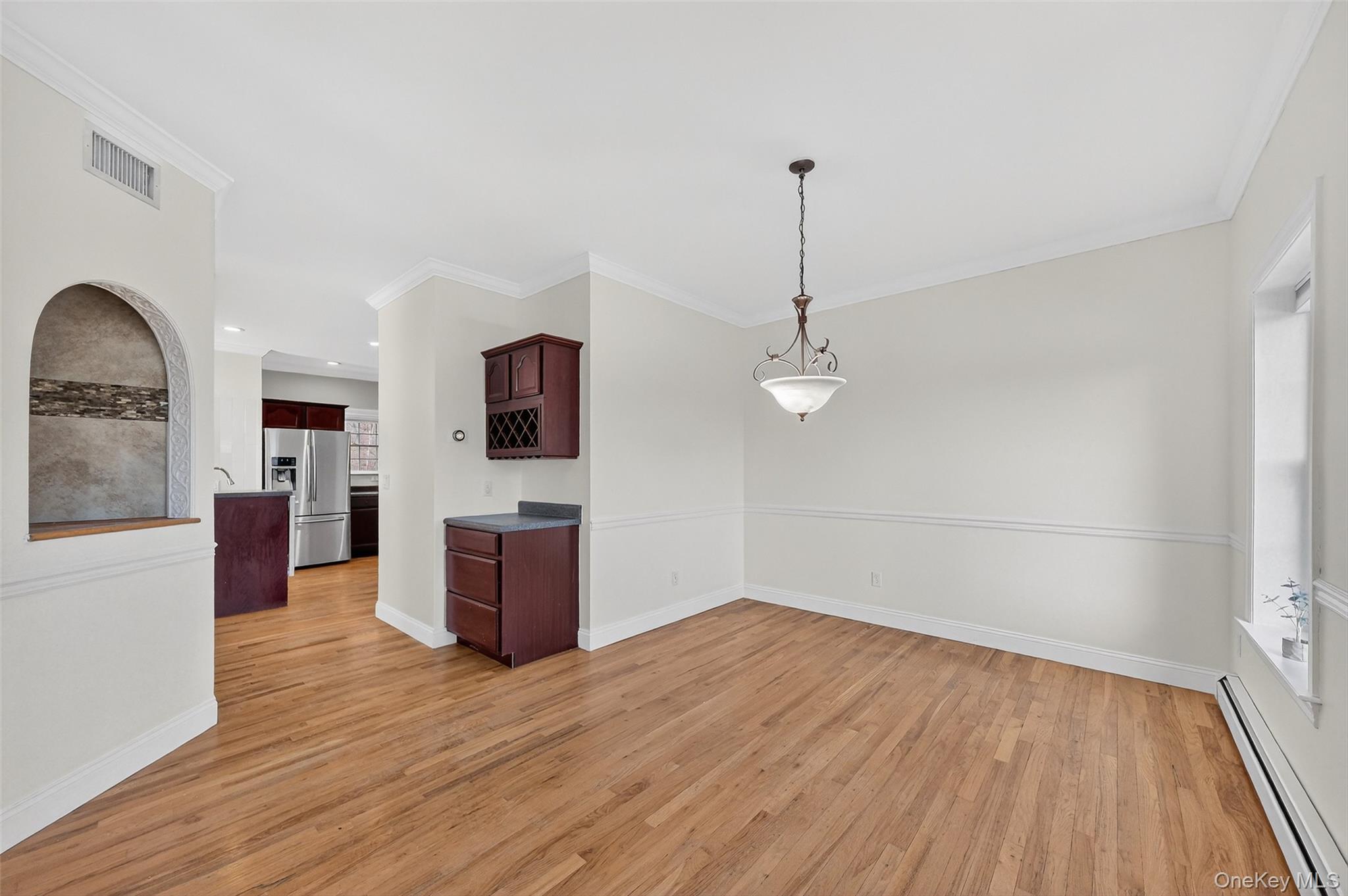 237 Lattintown Road Marlboro, NY 12542 - Photo 19 of 34 a view of a living room with hardwood floor and a ceiling fan
