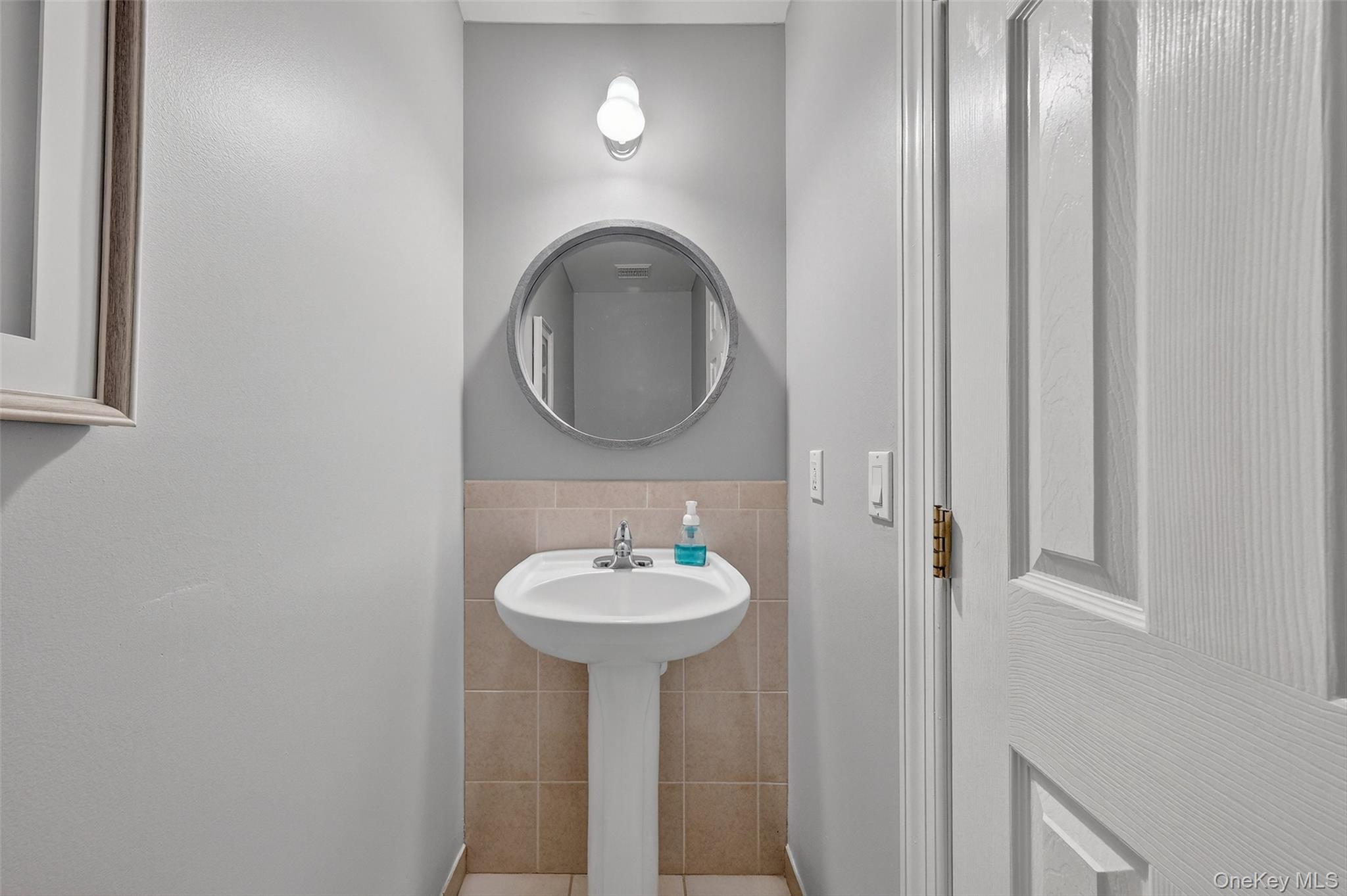 237 Lattintown Road Marlboro, NY 12542 - Photo 21 of 34 a bathroom with a sink and a mirror