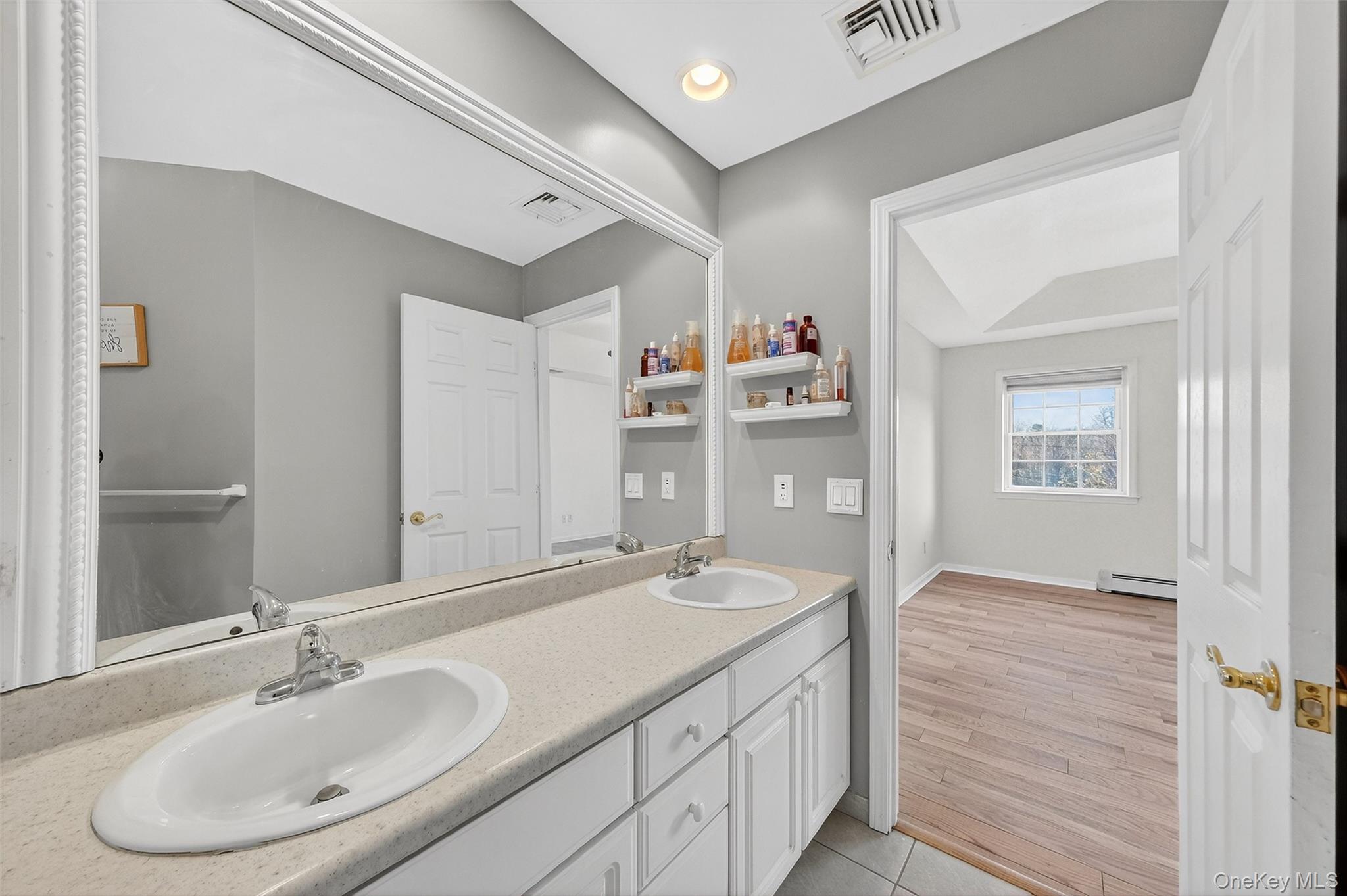 237 Lattintown Road Marlboro, NY 12542 - Photo 27 of 34 a bathroom with a sink and a mirror