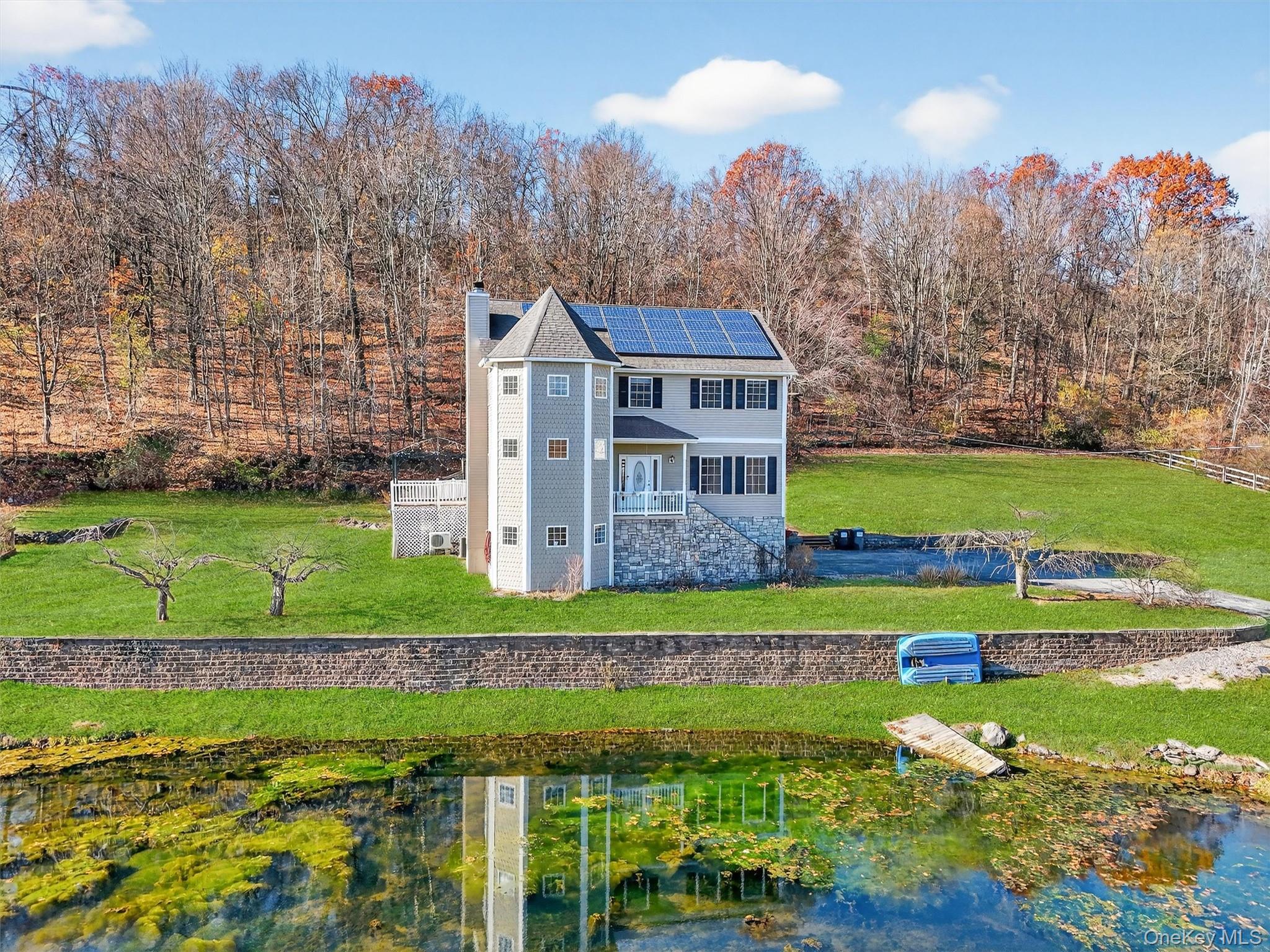 237 Lattintown Road Marlboro, NY 12542 - Photo 3 of 34 a view of a big house with a big yard and large trees