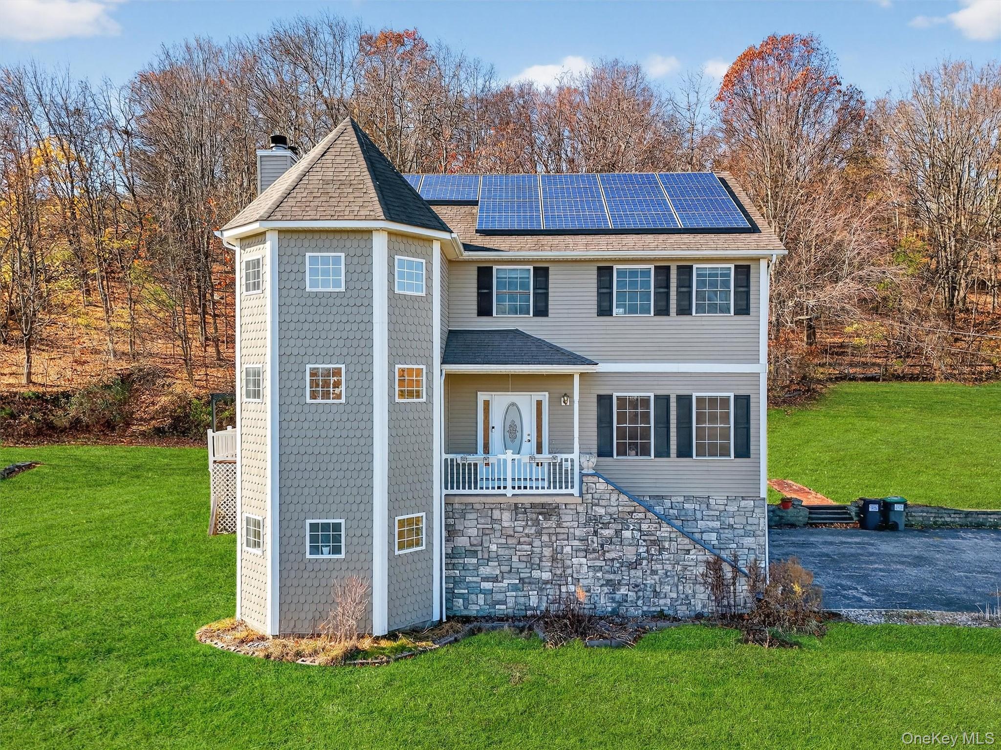 237 Lattintown Road Marlboro, NY 12542 - Photo 4 of 34 a front view of a house with a garden