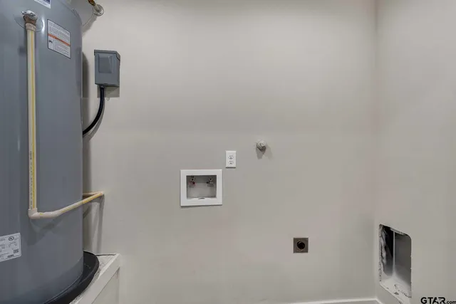 a bathroom with a shower and a mirror