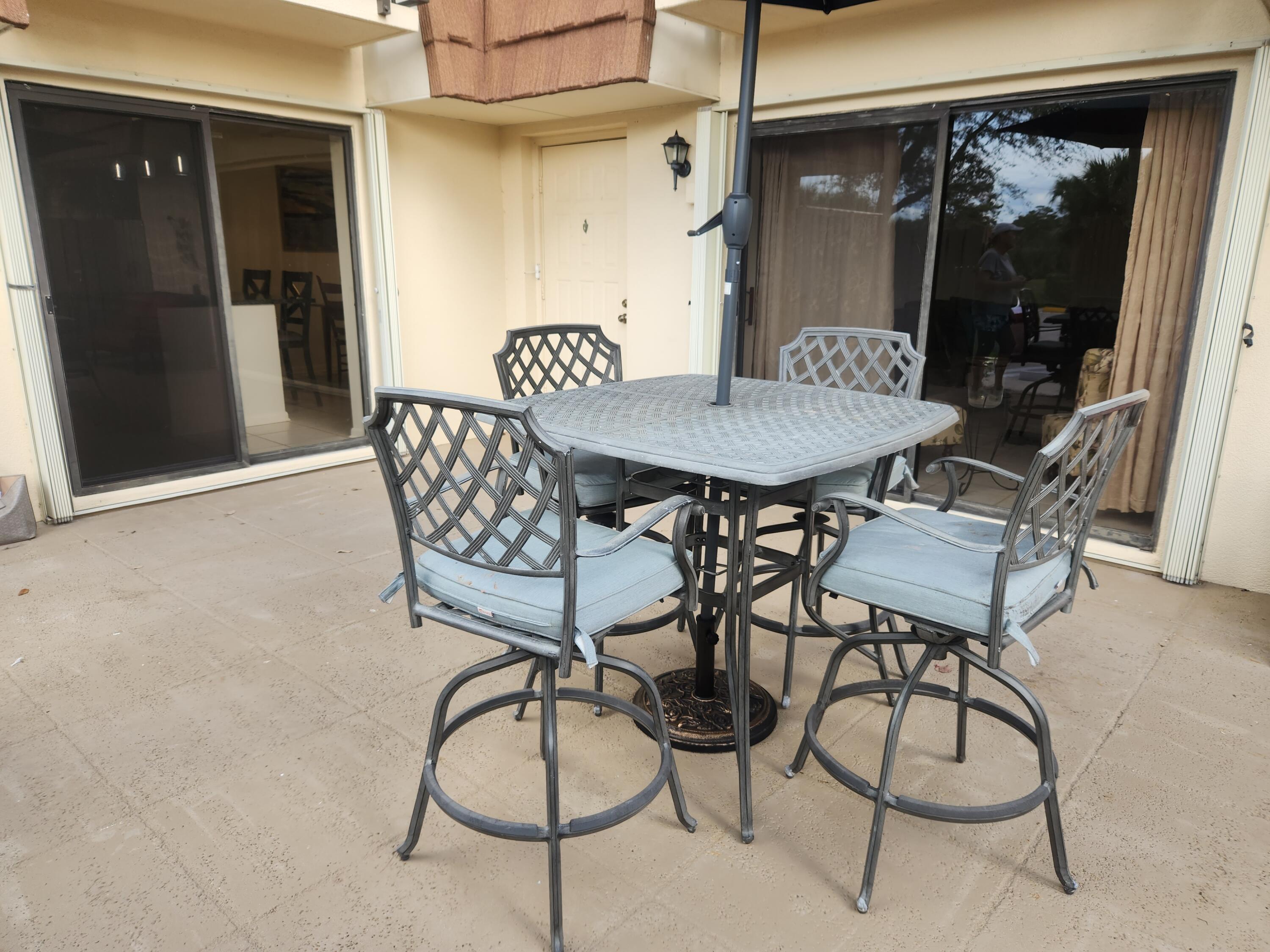 2813 28th Court Jupiter, FL 33477 - Photo 20 of 25 28th Court Patio