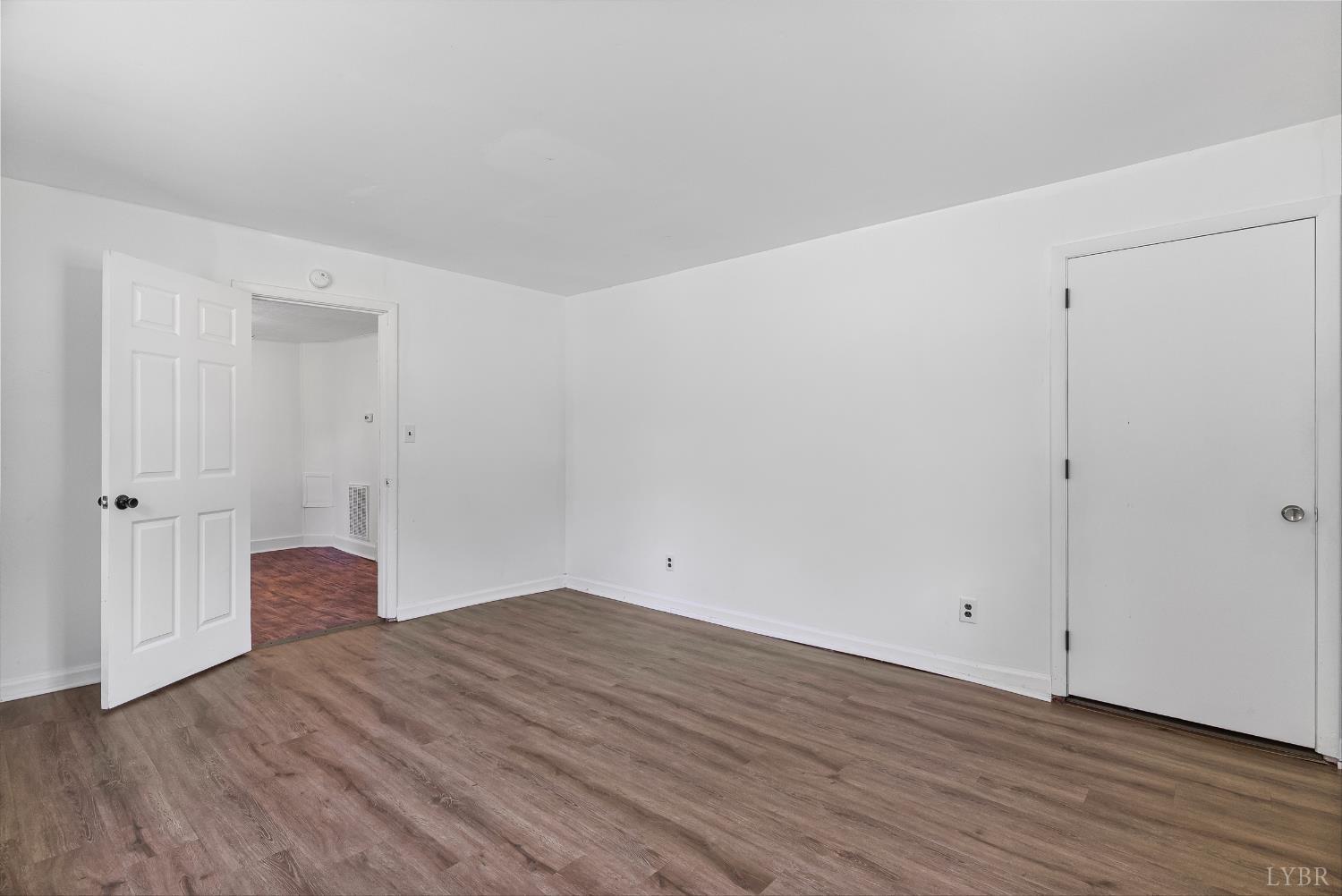 4970 Reedy Spring Road Spout Spring, VA 24593 - Photo 12 of 28 a view of empty room with wooden floor