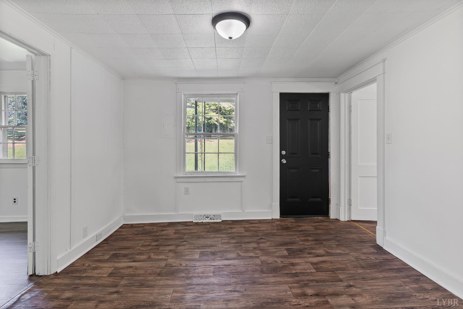 4970 Reedy Spring Road Spout Spring, VA 24593 - Photo 2 of 28 an empty room with windows and closet