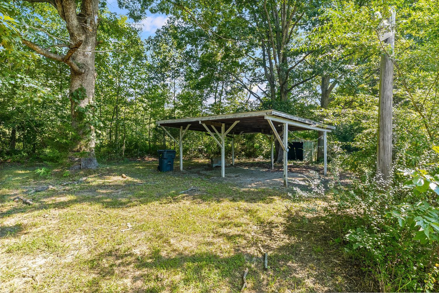 4970 Reedy Spring Road Spout Spring, VA 24593 - Photo 21 of 28 a view of a house with backyard