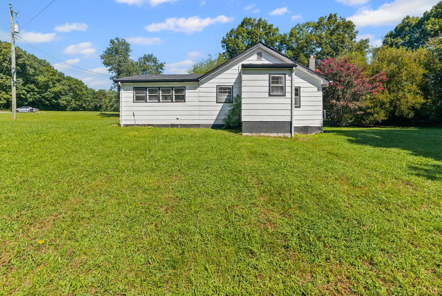 4970 Reedy Spring Road Spout Spring, VA 24593 - Photo 24 of 28 a front view of house with yard and green space