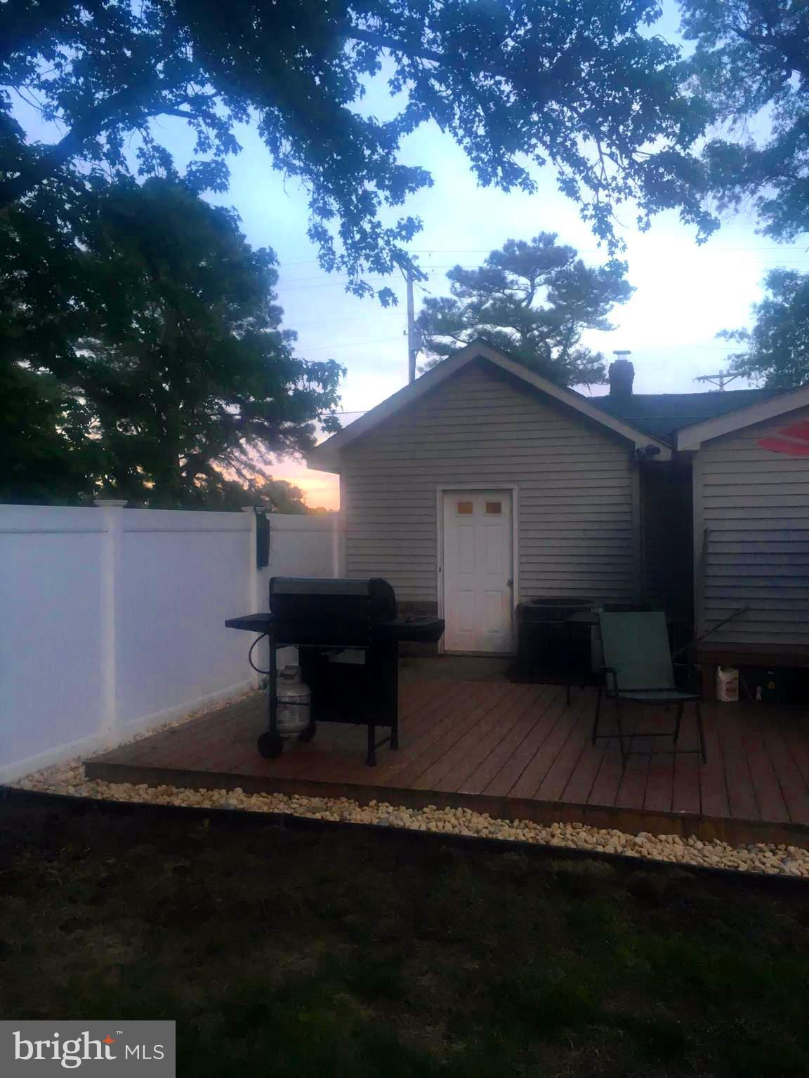 8565 Broomes Island Road Broomes Island, MD 20615 - Photo 27 of 29 deck with new maintenance privacy fence