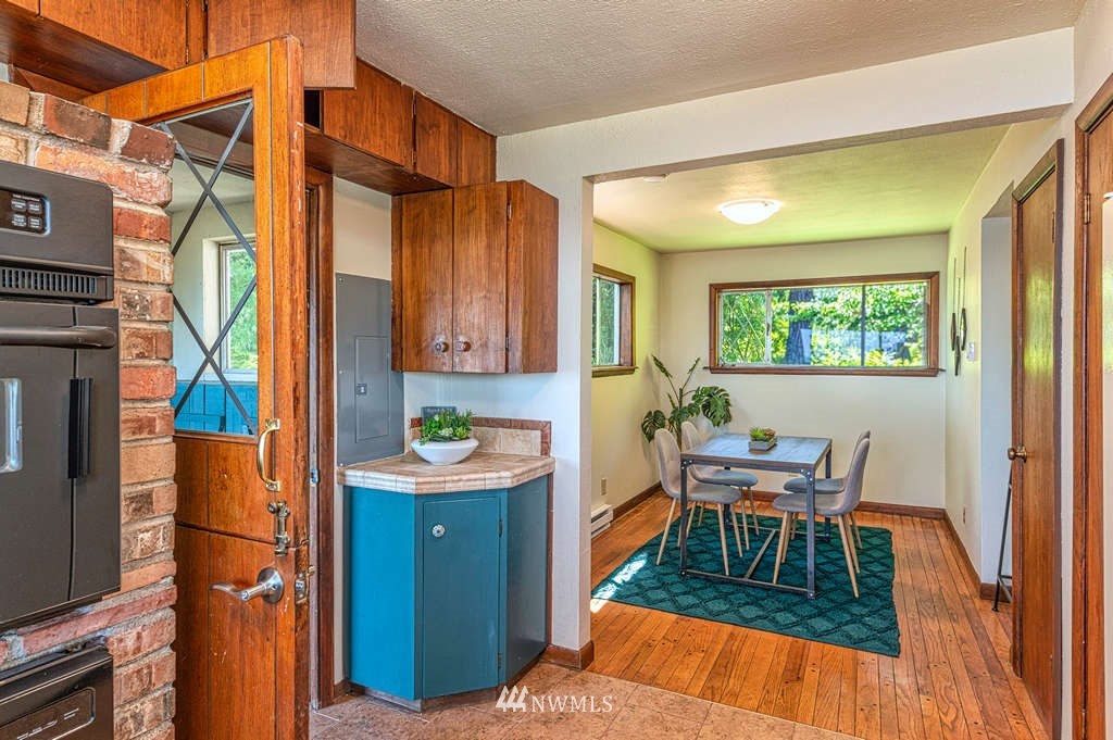 19102 Ridge Road Southwest Vashon, WA 98070 - Photo 14 of 29 a outdoor space with chairs