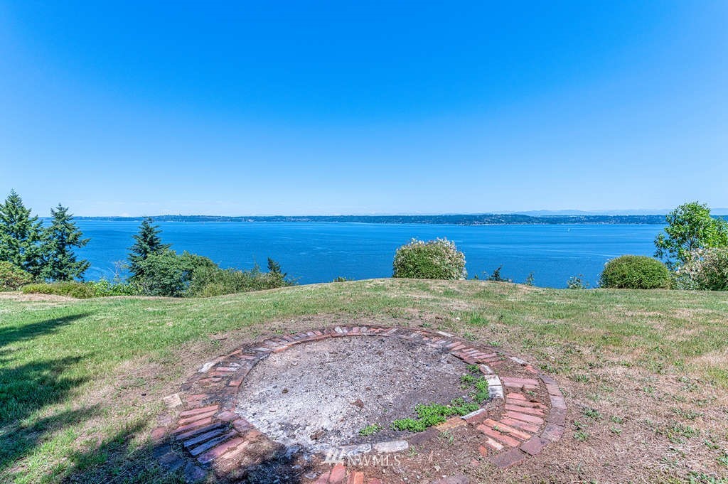 19102 Ridge Road Southwest Vashon, WA 98070 - Photo 19 of 29 a view of a yard with an ocean